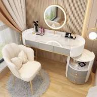 Round Dressing Mirror With A Modern Desk And Chair